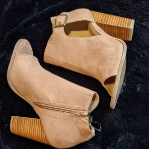 Peep toe booties with cut out